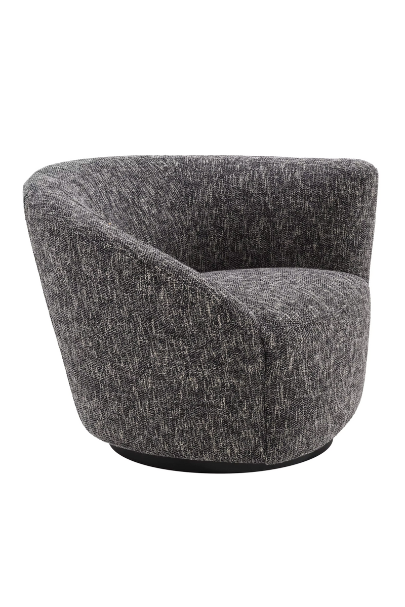 Black Asymmetrical Swivel Chair | Eichholtz Colin | Eichholtzmiami.com