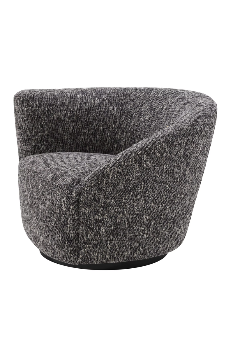 Black Asymmetrical Swivel Chair | Eichholtz Colin | Eichholtzmiami.com